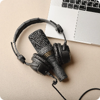 flat-lay-composition-with-microphone-podcasts-black-studio-headphones-brown-background-with-coffee-laptop-learning-online-education-conceptxa